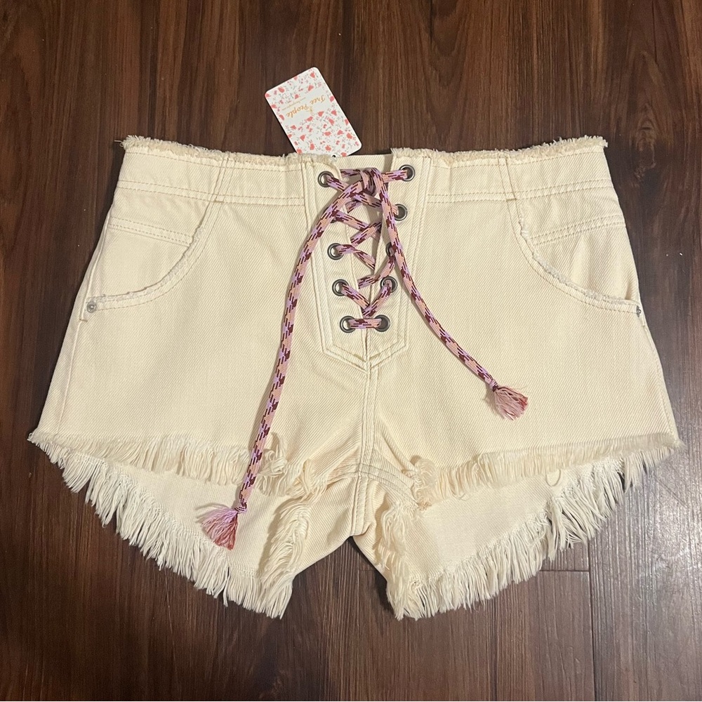 Free People Cream Lace-Up Frayed Shorts